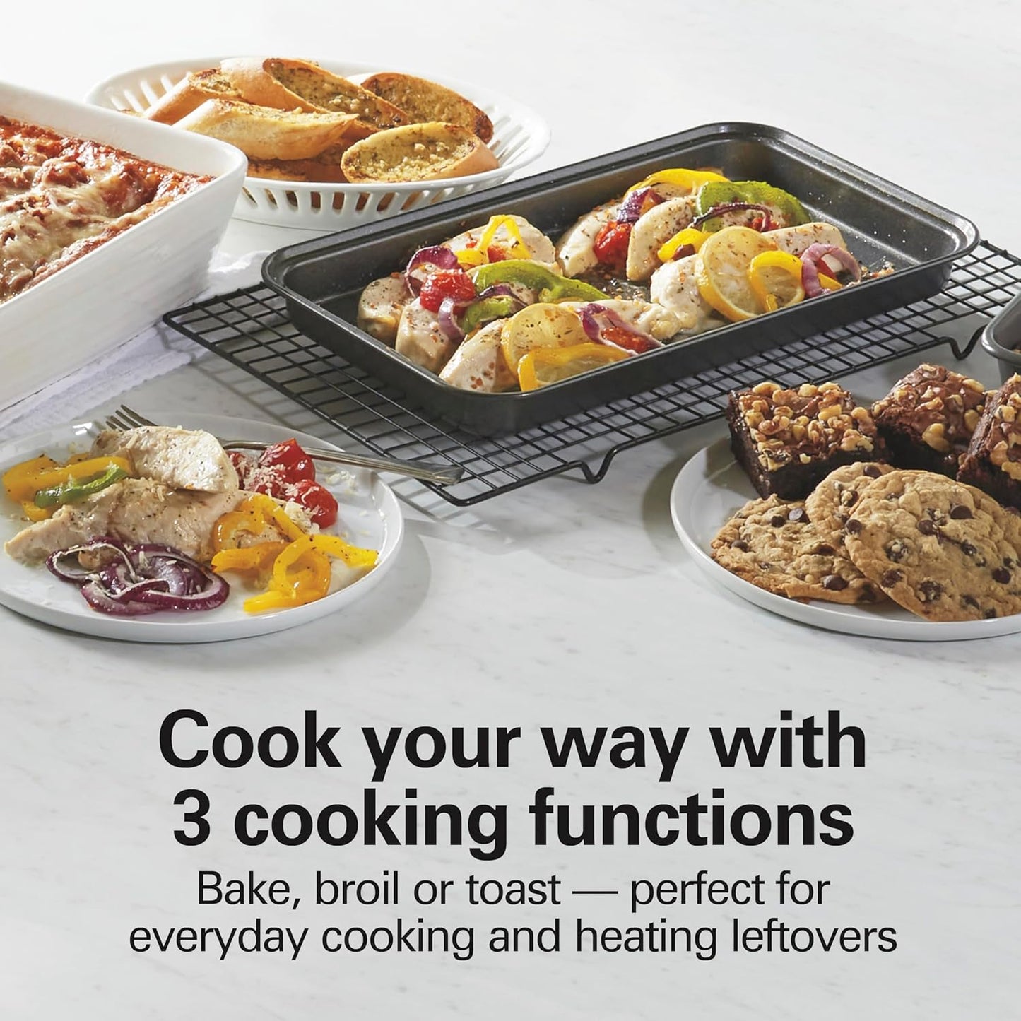 Hamilton Beach Easy Reach 4-Slice Countertop Toaster Oven With Roll-Top Door, 1200 Watts, Fits 9” Pizza, 3 Cooking Functions for Bake, Broil and Toast, Silver (31344DA)